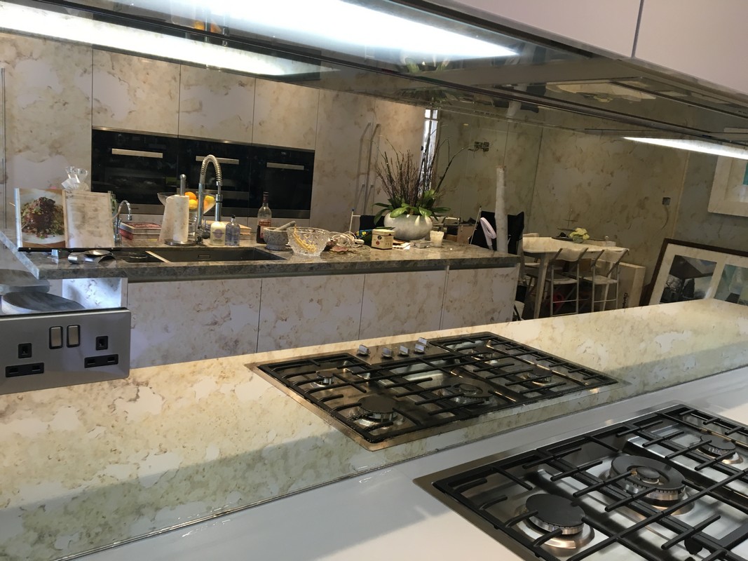 Mirror glass splashback in Kingston upon Thames luxury kitchen