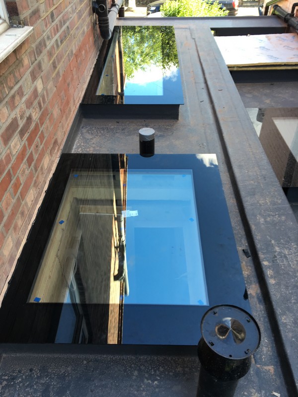 Multiple flat roof skylights on extension in Kingston upon Thames